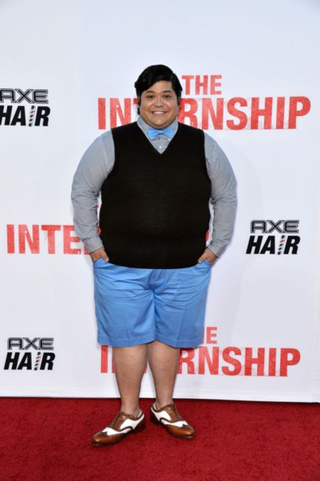 harvey in half sweater and blue shorts on the premier 